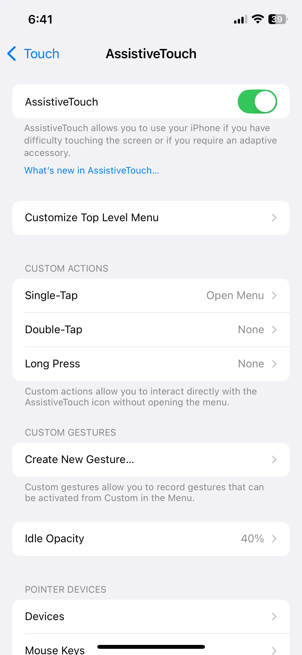 Cài đặt AssistiveTouch trên iPhone, một tính năng trợ năng giúp người dùng truy cập nhanh các chức năng.